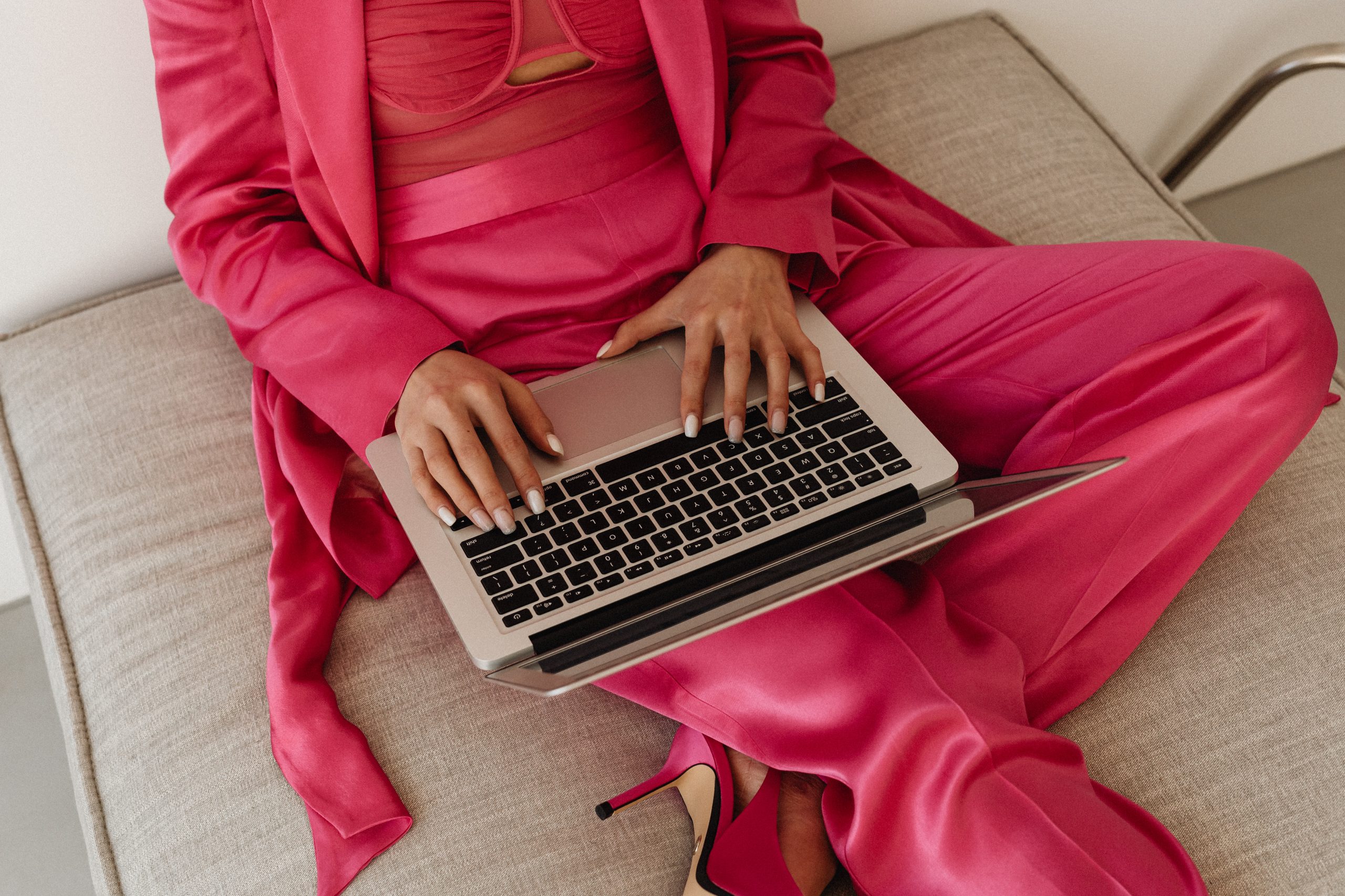 kaboompics_elegant-asian-businesswoman-in-satin-suit-focused-on-laptop-work-elegant-asian-businesswoman-in-satin-suit-focused-on-laptop-work-32063-scaled.jpg